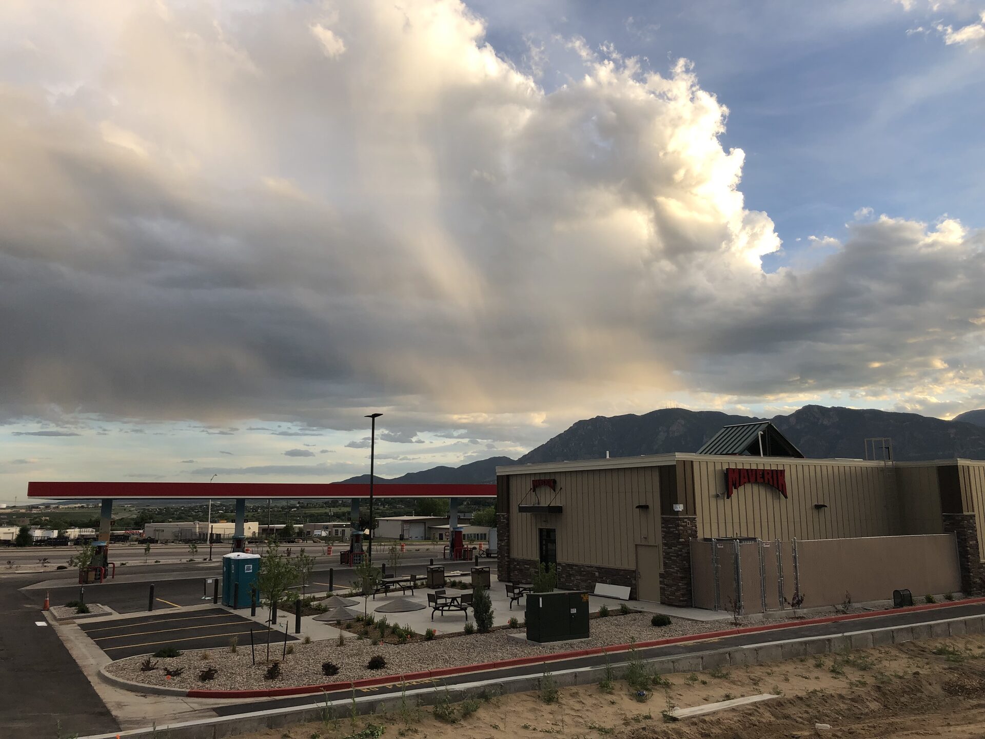 Commercial grounds built and maintained by Metropolitan Total Property at dusk against the Colorado Front Range